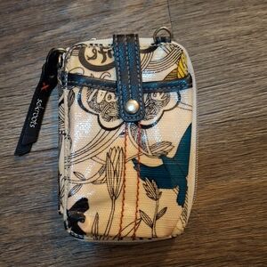 The Sakroots Crossbody Wallet.